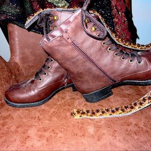 Brown lace up boots and ankle high. small heal inside zipper